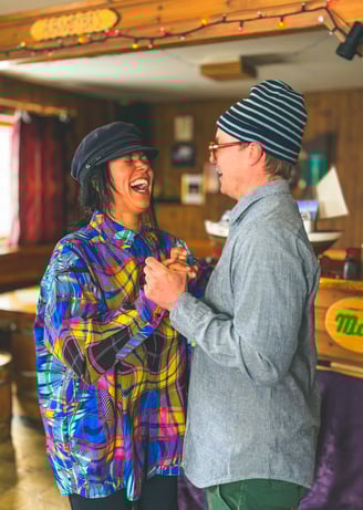 Maria and Ulrik dancing salsa in a pub in the Lyngen Alps | ski and sail in Norway