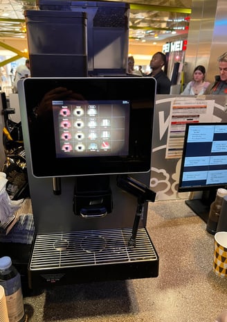 Franke espresso machine brewing coffee at a commercial food service location in South Florida