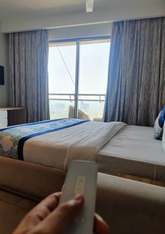 Image of a clean and comfortable bed inside a luxury apartment
