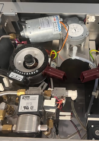 Inspection of internal gears and solenoids in super-automatic espresso machine