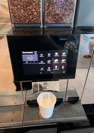 Thermoplan Black&White4c coffee machine serving a cappuccino in South Florida