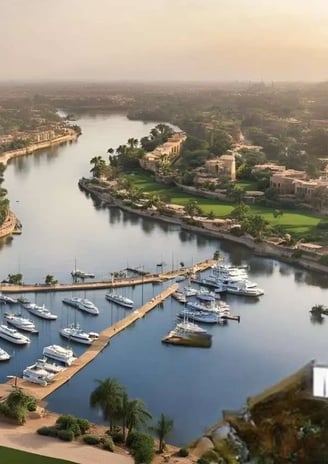 صف يخوت فاخر بجوار وحدات سكنية مطلة على النيل في مشروع جريان