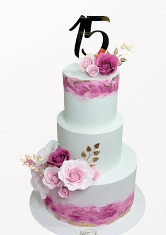 a cake with a number of flowers on it