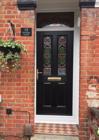 new black front door with bespoke glass which was fitted in Woolston, Southampton by Buildmydoor