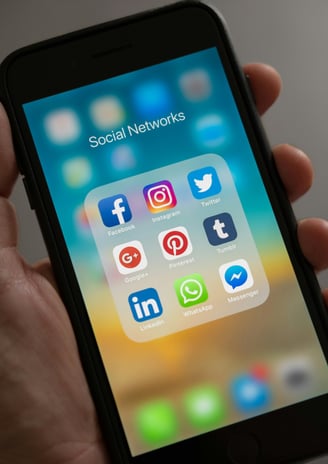 a mobile shone showing the list of social media icons