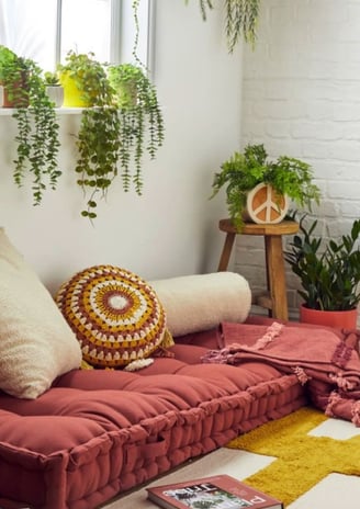 a living room with a couch and a rug