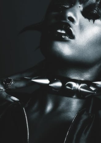 african american woman with large spiked collar for BDSM/bondage