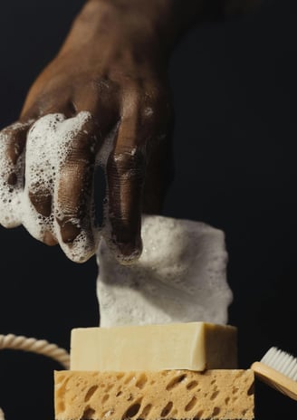 soapy hand with cleansers for sex toy hygiene