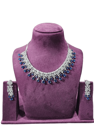 a purple necklace and earring set with a necklace and earring