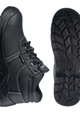 a pair of black leather work boots with a black sole sole