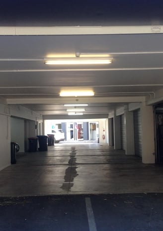 a parking lot with a parking lot and a parking lot