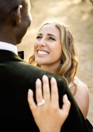 Bride gazing lovingly into the groom's eyes during their elopement in Provence