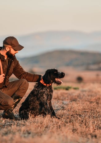 Hunter wearing a hunting nato style watch band for his hunting tactical watch.
