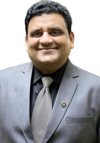 a man in a suit and tie with a tie