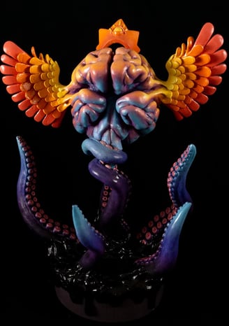 sculpture of a brain with wings trying to fly with wings, but it's being held down by tentacles