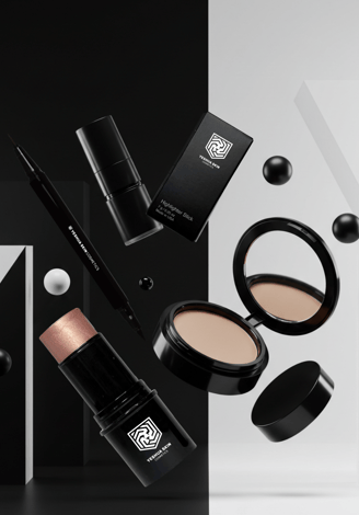 a variety of cosmetics products including makeup and cosmetics floating around geometric shapes