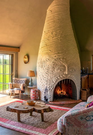 wilderness reserve, suffolk, hotel room with a fire place