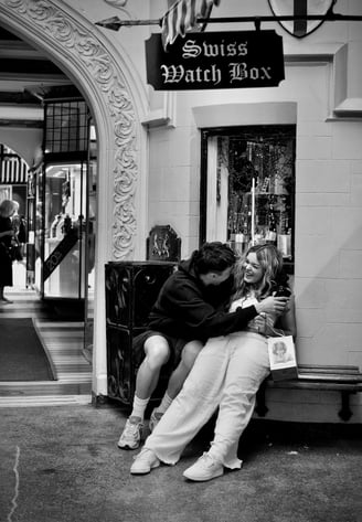 Young lovers on a bench in London Court, Perth by street photographer Peter Pickering