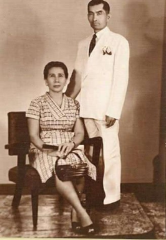 a man and woman posing for a photo