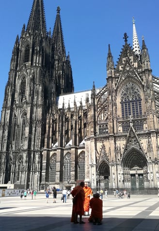 monchs photographing at Dome of Cologne