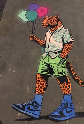 Imagem de um graffiti feito por Sérgio Astral, titulo mano onça