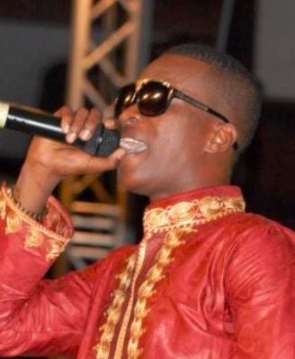 K.K Fosu singing a song.