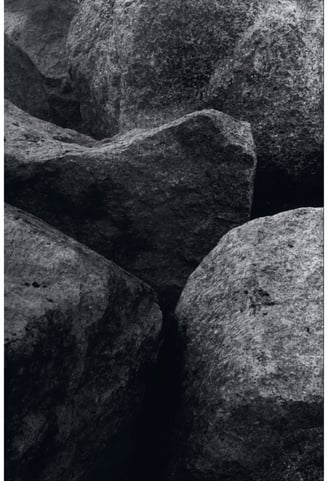 a close up photograph of several boulders. Abstract