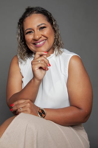 a woman with a red lipstick and a white top
