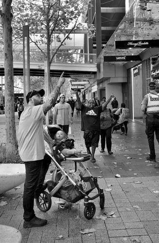 Street photographer Peter Pickering snaps the moment a father points out something to his child