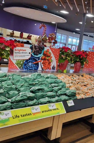 poplar bluff organics and carrots by cam display in local grocery store calgary