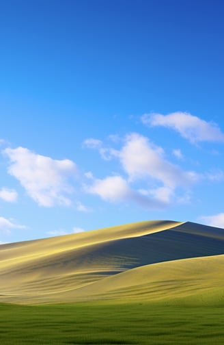 wallpaper - a green field with a blue sky and clouds