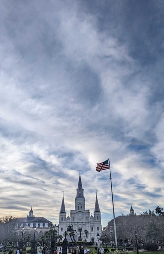 st-louis-cathedral-new-orleans-sky-us-flag