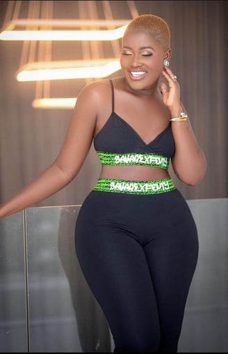 Fella Makafui in a trainers wear.