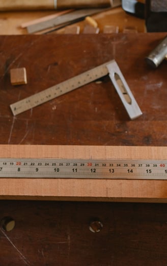 a person holding a ruler