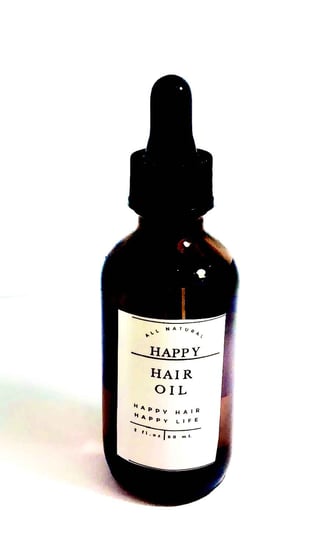 A happy hair oil bottle