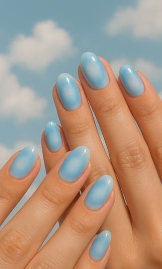round nails featuring sky blue and white gradient aura nail design, subtle shimmer, soft clouds