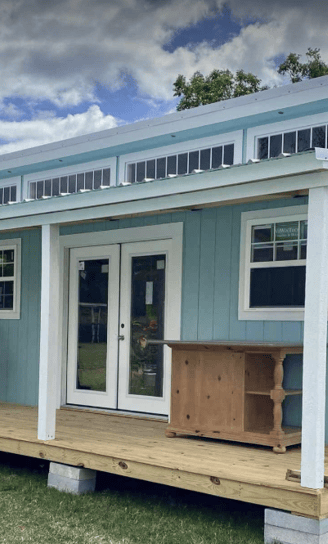 Studio shed with front porch and French doors