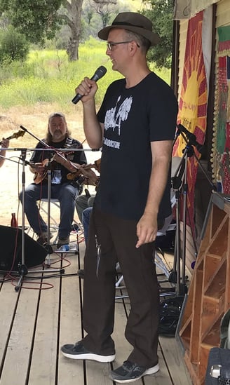 Jeremy Grant Horton Calling a Square dance at the Topanga Fiddle Conest.