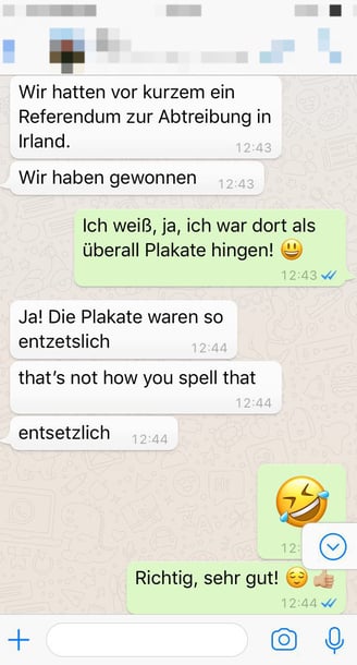 a screenshot of a whatsapp chat in german - language learning, correction by a native speaker