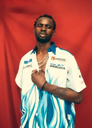 Black Sherif in a shirt.