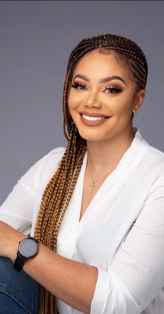 Nadia Buari smiling graciously.
