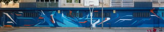 MES Ink graffiti mural en instituto Banús