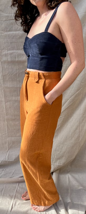 A navy corduroy bustier and honey brown flannel pants