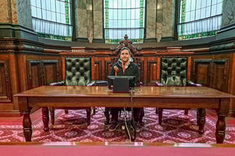 Siiting in Lord's Mayor chair in Melbourne Town Hall