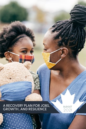 a woman in a blue shirt and a child in a blue shirt and a teddy