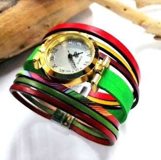 a wrist watch with a colorful colored leather bracelet