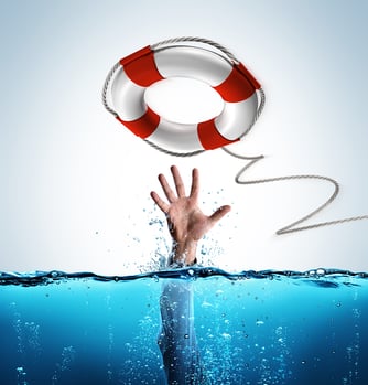 Photo of hand in deep water reaching for lifesaver to symbolize how supplemental and disability insurance can be a lifesaver.