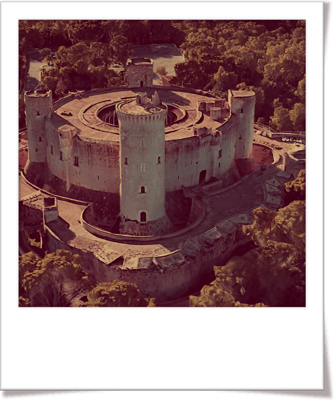 a castle like structure with a tower in the middle of it