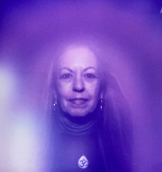 Elisha teaches meditation and uses psychic readings to assist in personal enlightenment.