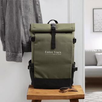 a backpacker's backpacker bag with sunglasses on a wooden table